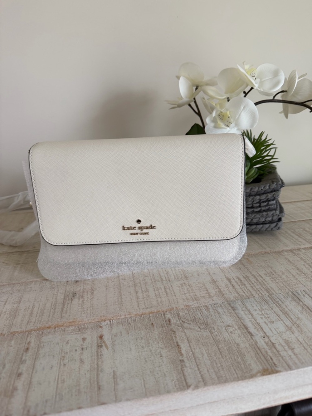 kate spade Ivory Saffiano Leather Crossbody with Gold Logo